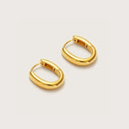 Gold Oval Huggies close-up showing oval shape profile