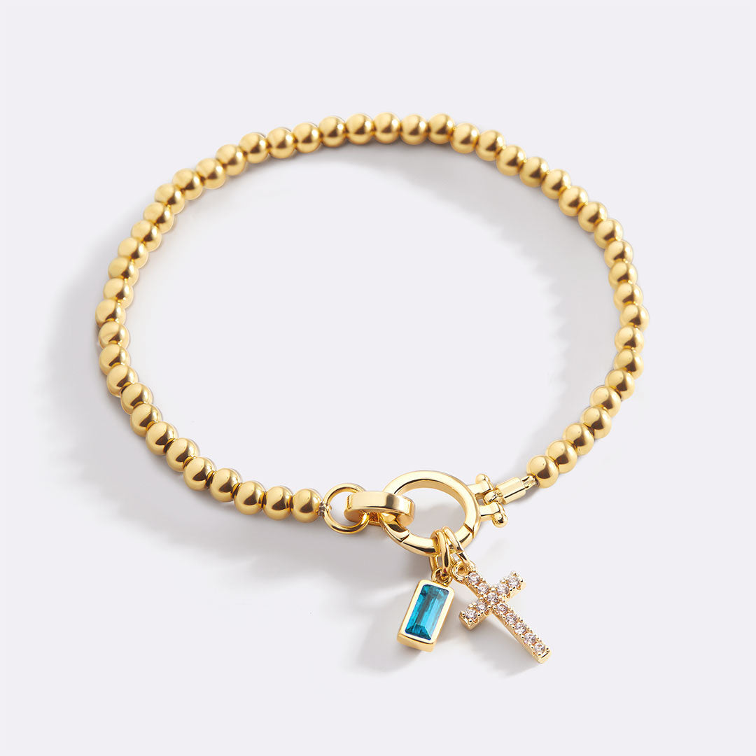 Birthstone Cross Charm Bracelet, March Aquamarine / 6.5"