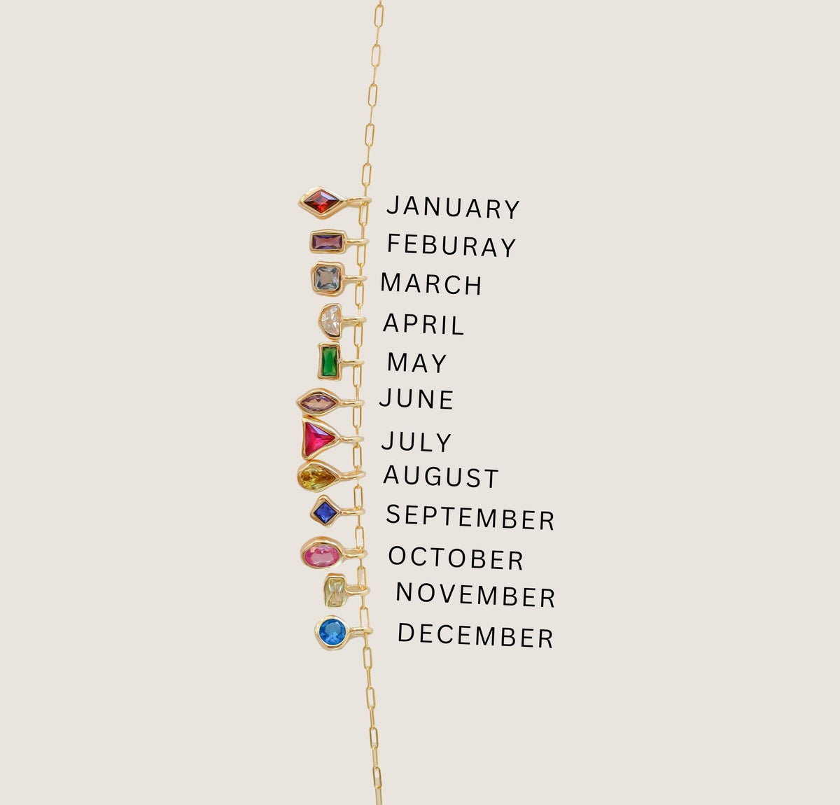 The LLUME Jewelry Build a Birthstone Necklace features a gold chain with twelve gemstone charms for each month, representing birthstones. The months are vertically listed in uppercase beside this customizable necklace.