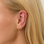 Gold Heart Charms styled on huggie earrings