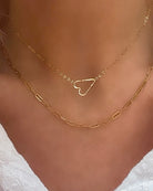 Itty Heart gold necklace product lifestyle photo