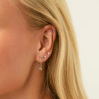 Silver Heart Charms styled on huggie earrings