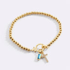 Birthstone Cross Charm Bracelet