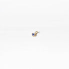 The Build a Birthstone Necklace by LLUME Jewelry features a small gold-plated charm pendant with a square blue gemstone at its center, ideal for customizing your own birthstone necklace. Shown on a plain white background.